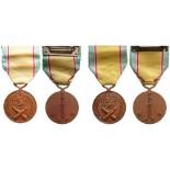 Lot of 2 War Service Medal, instituted in 1950 Breast Badge, Bronze, 32 mm, Korean inscriptions on
