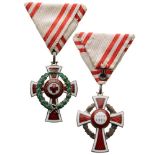 HONOR DECORATION OF THE RED CROSS 2nd Class Cross with War Decoration, instituted in 1914. Breast