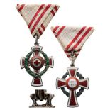 HONOR DECORATION OF THE RED CROSS 2nd Class Cross with War Decoration, instituted in 1914. Breast