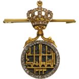 An outstanding, Diamonded Honour Badge of the Egyptian Dynasty Round, engraved and dark-toned