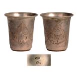 Small silver vodka tumbler Straight form, carving by structured motives, 4.4 cm high, weight 18