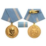 Mario Munoz Medal Breast Badge, 30 mm, gilt Bronze, original suspension ring and ribbon with