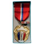 Philippines Liberation Medal, instituted in 1944 Breast Badge, gilt bronze, 42 x 36 mm, partially