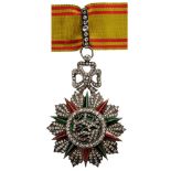 ORDER OF NICHAN AL IFTIKHAR  A jewelled Commander's Cross. Breast Badge of the type awarded under