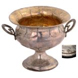 Silver gilt cup on pedestal base Lateral handles and lobed sections, carving with eggshaped