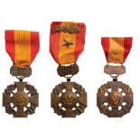 Bravery Crosses, instituted 1950 Breast Badges, bronze, 40 mm, one US made, the two others French