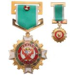 ORDER OF MERIT OF THE NATIONAL POLICE Officer’s Cross. Breast Badge, gilt metal, 49 mm, enameled,