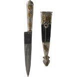 Lot 2 vintage Gaucho daggers with scabbards First dagger: Leather scabbard with embossed alpaca