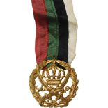 Arab Legion Medal Breast Badge, 45 mm, gilt Bronze, original suspension device and ribbon. Very