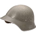 Fireman Helmet, 1950-1980 Made aluminum painted grey. Paint: 80% of the surface. Leather liner and