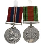 Lot of 2 Decorations Defense Medal, War Medal, 1940-45, both medals instituted in 1945. Breast