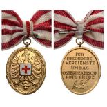 HONOR DECORATION OF THE RED CROSS Gold Medal of Merit. Breast Badge, 40x33 mm, gilt Bronze,