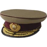 RSR Doctor General visor cap, dated 1981 Made in khaki cloth, with the burgundy band and piping, the