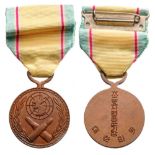 War Service Medal, instituted in 1950 Breast Badge, bronze, 32 mm, original suspension ring and