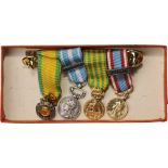 Personal bar of 4 Miniatures Military Medal 4th or 5th Republic, Colonial Medal with clasp “Ext-