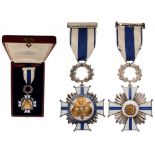 ORDER OF MERIT OF DUARTE SANCHEZ AND MELLA Knight's Cross, 5th Class, instituted in 1954. Breast