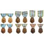 Lot of 6 War Commemorative Medals, 1939-45 Breast Badges, Bronze, 40x28 mm, original suspension