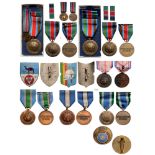 Group of Medals and Badges from the UN including Badges and Medal of the Emergency Force Breast
