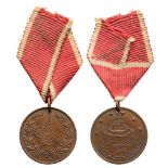 Akka Medal, instituted in 1840 Breast Badge, brass, original suspension ring and ribbon. I