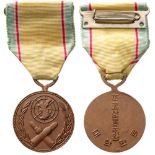 War Service Medal, instituted in 1950 Breast Badge, bronze, 32 mm, Korean inscriptions on back,