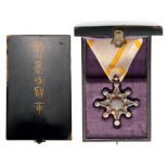 ORDER OF THE SACRED TREASURE (Kunnito zuihisho) 8th Class Badge, instituted in 1888. Breast Badge,