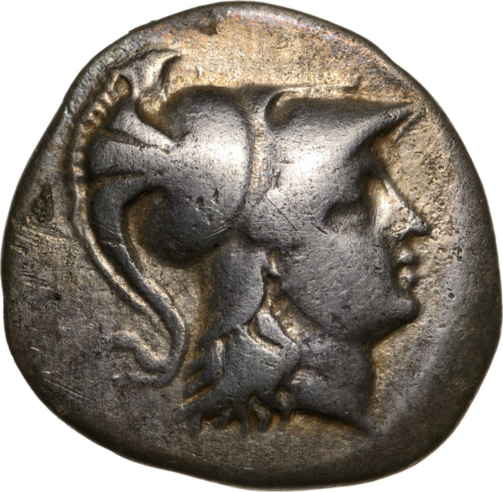 Head of Athena right / Nike advancing left. SNG Cop. 405. VF