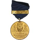 Medal 1935, gilt Metal (35 mm), with original suspension loop, ribbon and ribbon bar, â€œPentru