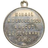 (leader of the conservative party and served as a short period as Prime Minister in 1918). Medal