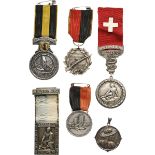 IMPORTANT LOT OF 9 SWISS MEDALS AND BADGES