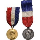 Gold (1947) and Silver Honor Medal of Labour (1916)