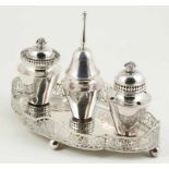 Embossed silver ship´s inkstand, engraved and with fretwork. Silversmith Damián de Castro (1716-