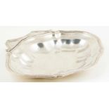 Silver shaving basin with handle attached. 18th century. Marked Martínez 1791.↵Bibliography: A