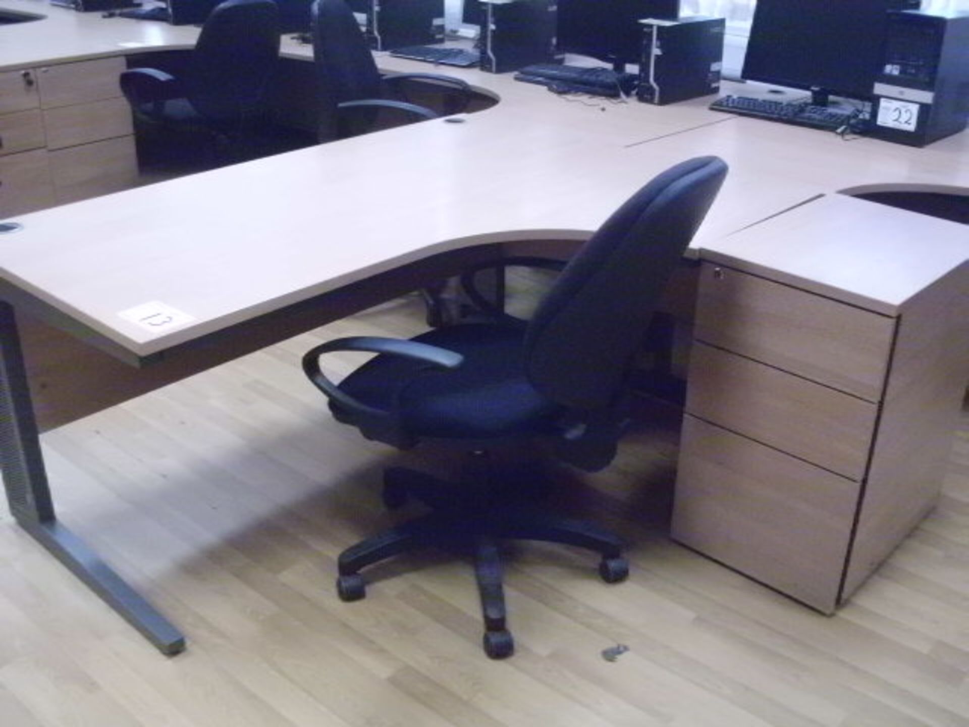 5' x 4' curved light oak effect DESK with black fabric SWIVEL ARMCHAIR