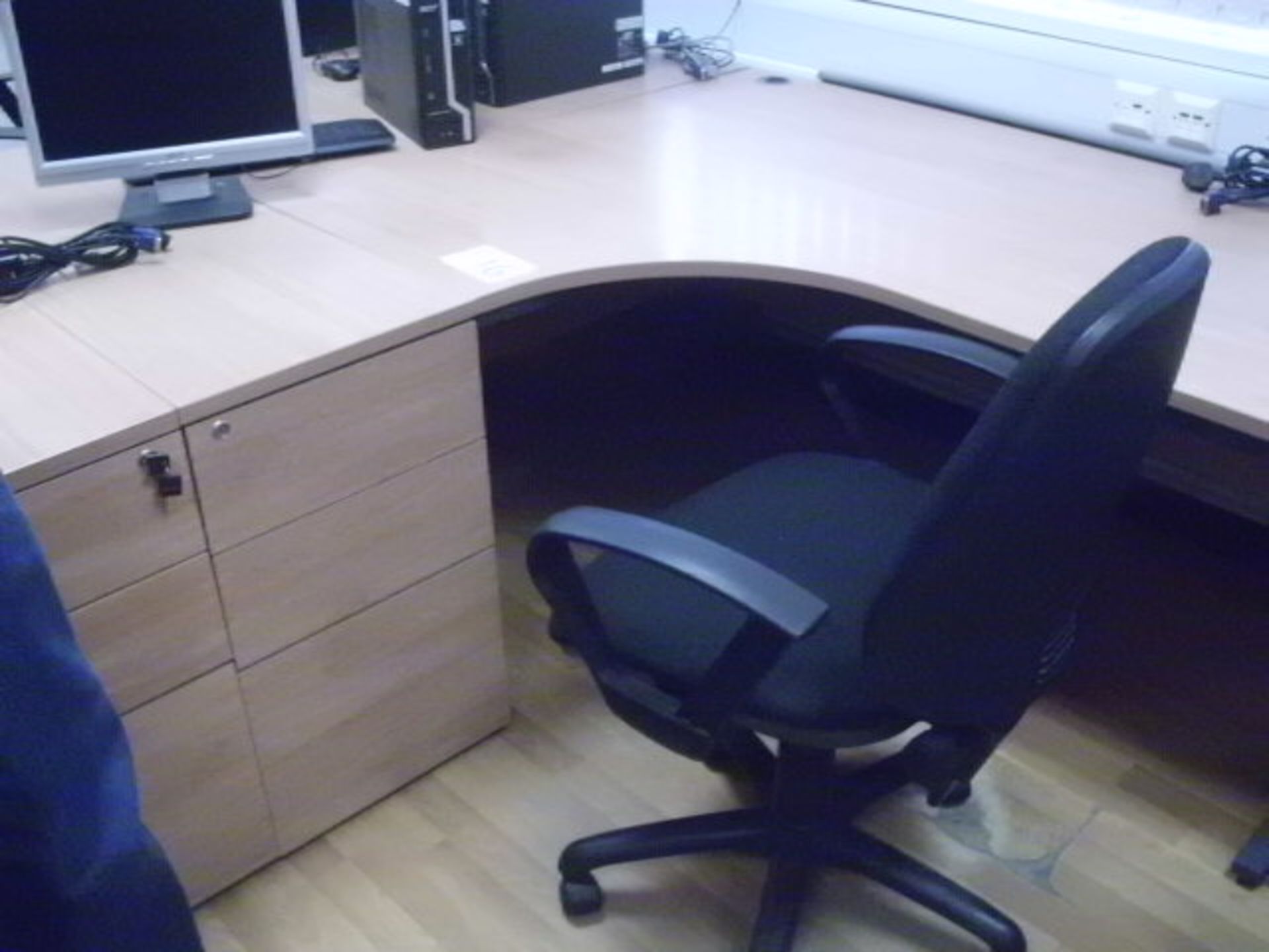 5' x 4' curved light oak effect DESK with black fabric SWIVEL ARMCHAIR