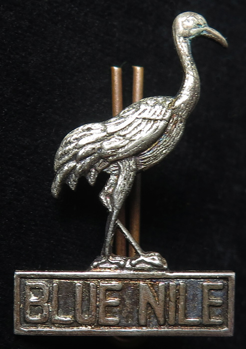 Sudan, Blue Nile Province native silver badge shows a crane. 2 lugs and split pin. (From the