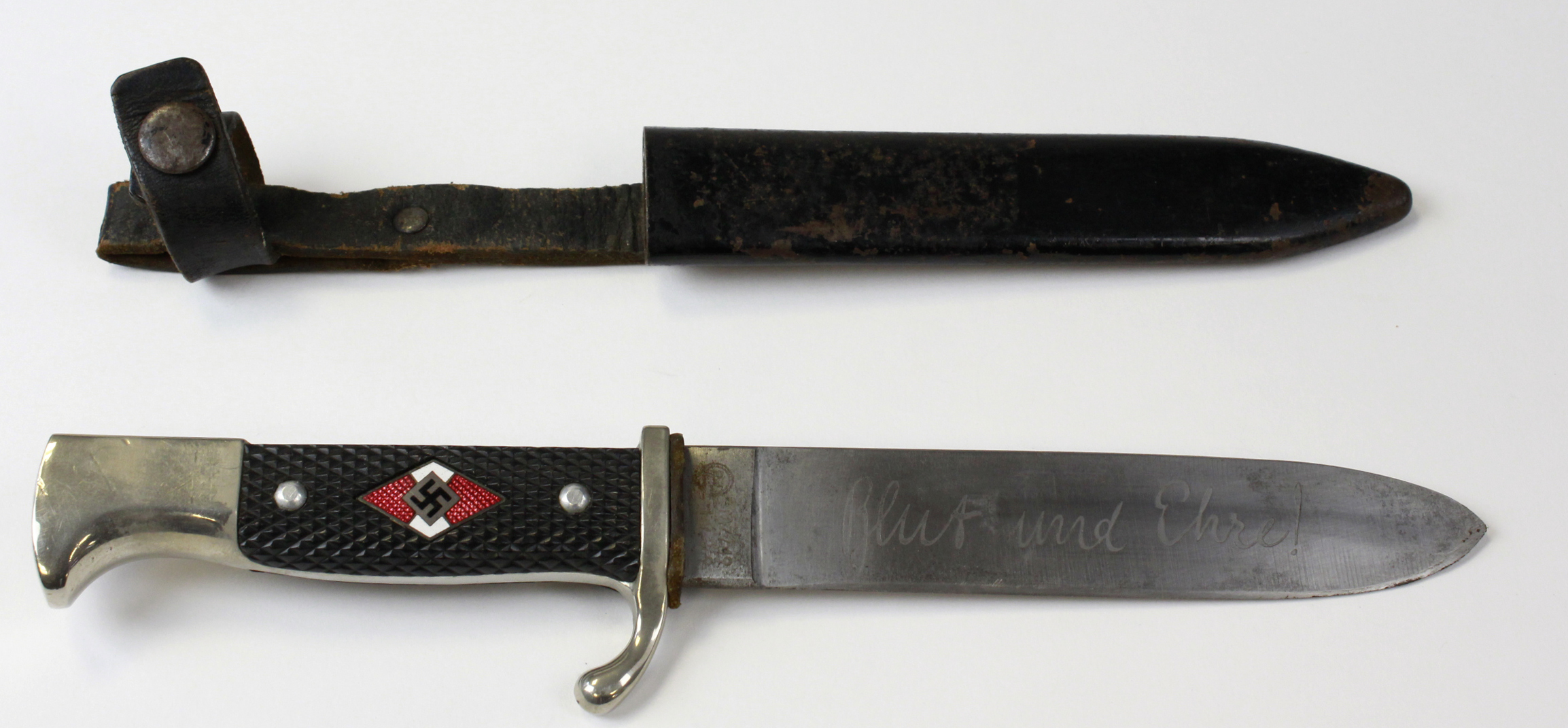 HJ Dagger RZM 49 1939 with motto. Diamond very good not chipped. Scabbard with clip unbroken.