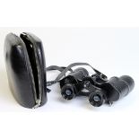 Modern 8x30 binoculars in soft carry case with plastic strap. GC.