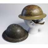 1940 dated JSS Kaki coloured British helmet including strap. Tropical /Desert use. No rear skirt