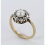 18ct Gold Ring Central Pearl surrounded by 10 x 0.10ct Diamonds size S weight 5.0 grams