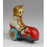 Japanese tinplate clockwork cat in a boot by Yanoman Toys, circa 1950s-60s, missing key, length 13.