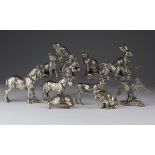 Twelve silver plated animal ornaments, including horses, deer, dog, pig, fox, cat, etc., tallest 9.