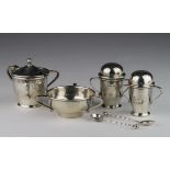 A.E. Jones silver Cruet Set comprising two salts and two peppers plus two salt spoons. two Salts and
