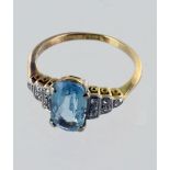 18ct Gold Ring set with Aquamarine with Diamond shoulders size K weight 3.2 grams