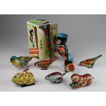 Eight tinplate clockwork toys, comprising birds, cat, dog, mouse, etc., mostly Chinese & Japanese,