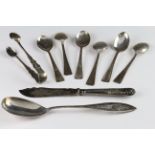 Mixed lot of silver flatware comprising 6 teaspoons, tongs, silver handled butter knife and Indian