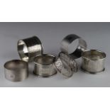 Six silver napkin rings - all various British hallmarks. Weight 4oz approx