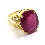 18ct Gold Ring set with Ruby (10.9 ct weight) and White sapphires size T weight 12.6 grams