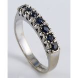 18ct White Gold Ring set with 7 Sapphires size K weight 3.6 grams
