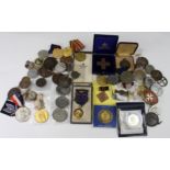 Assorted Medals & Medallions: A biscuit tin containing over 50 medals & medallions including: