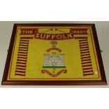 Suffolk Regiment interest - a large glazed and framed piece, Battle Honours and Regimental Crest,